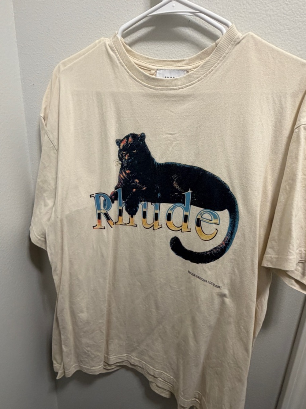 Rhude Cream Tee with Black Panther Graphic